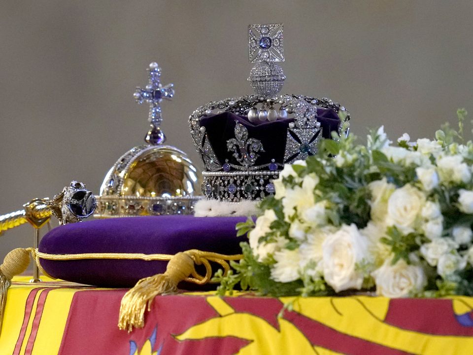 The coffin of Britain's Queen Elizabeth II draped in the Royal Standard.