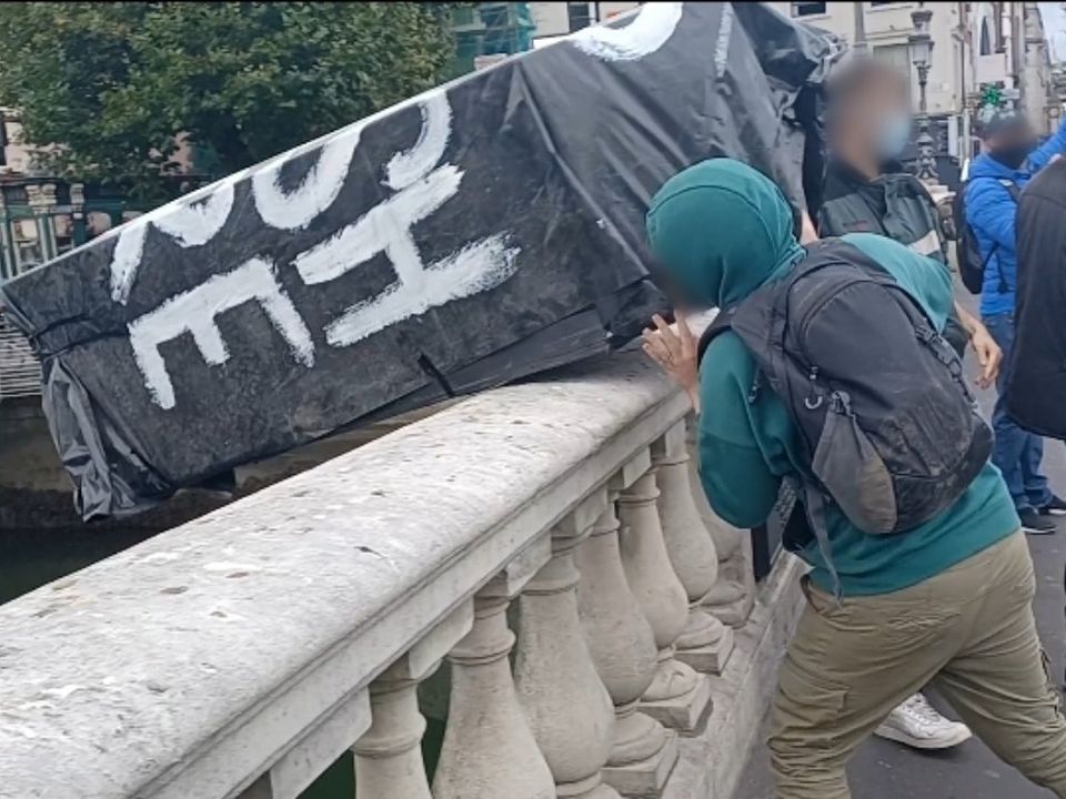 Protestors launched the coffin into the river on Monday. Photo: Anti Imperialism Action Ireland