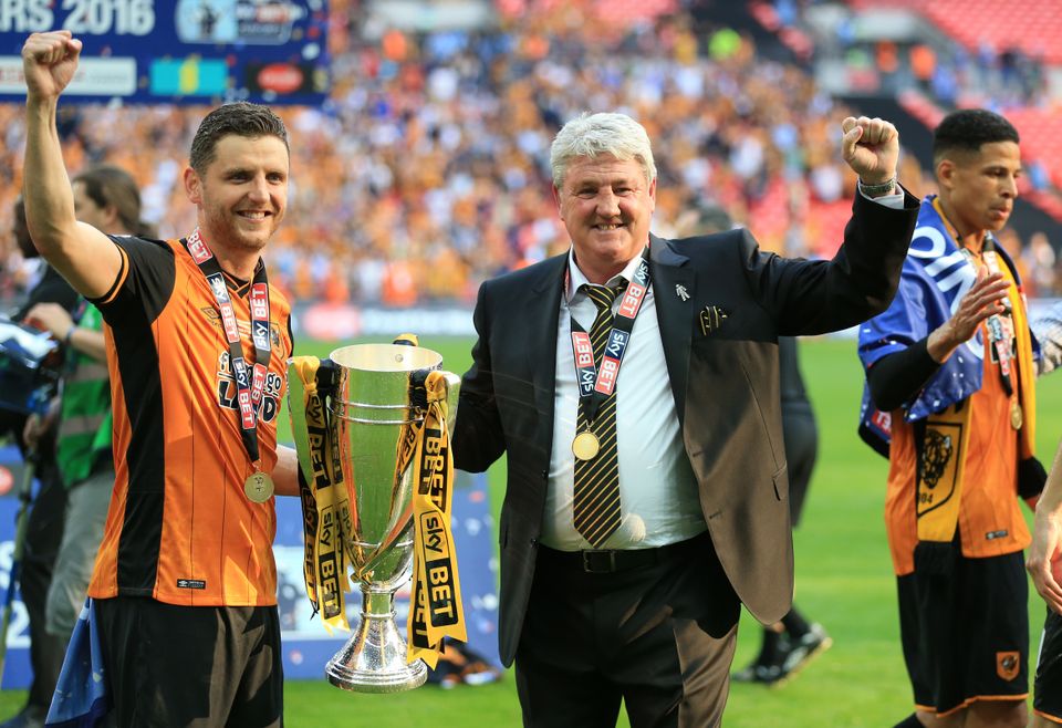 Hull manager Steve Bruce, right, and his son Alex celebrate after the 2016 Championship play-off final at Wembley (Nigel French/PA)