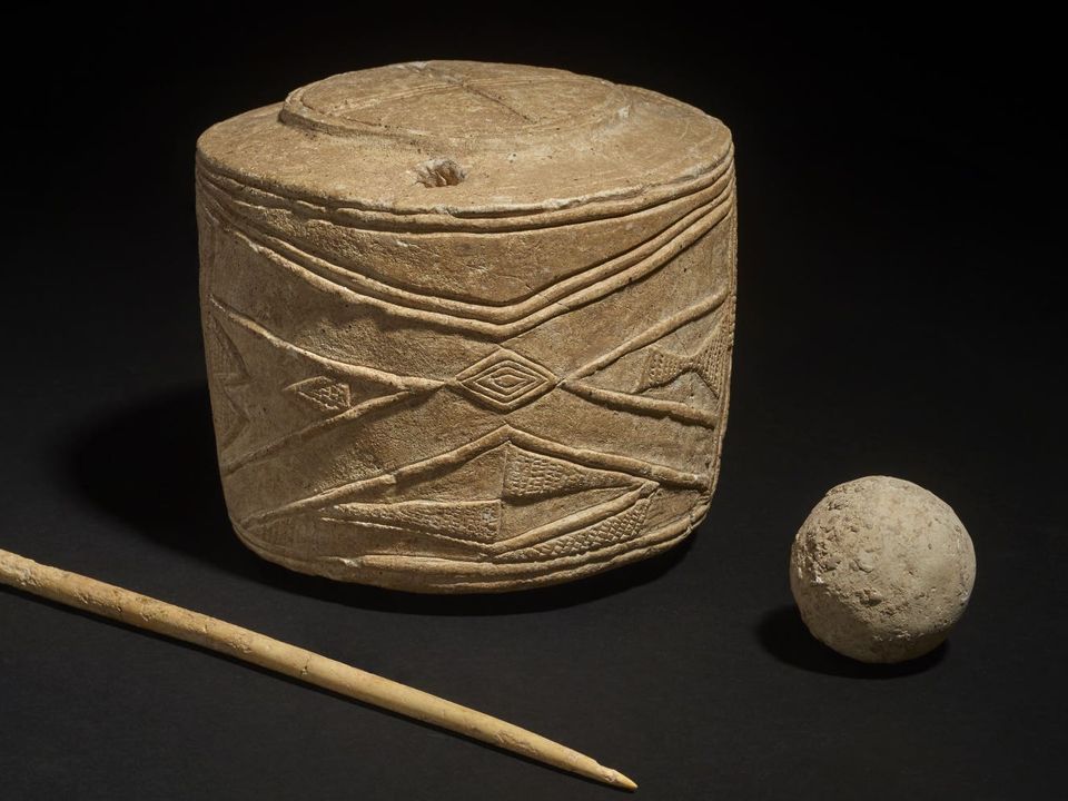 The Burton Agnes chalk drum, chalk ball and bone pin (British Museum/PA)