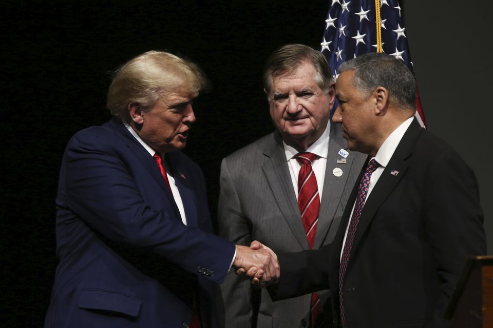 Mr Trump with Republican chiefs in New Hampshire (AP)
