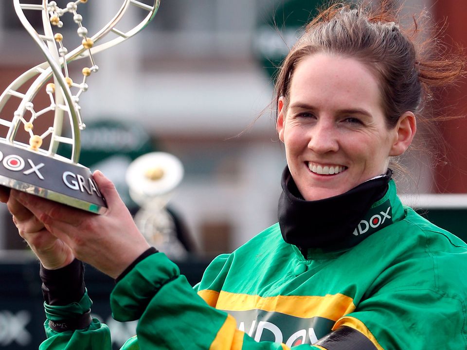 Rachael Blackmore holds the Grand National trophy. PA