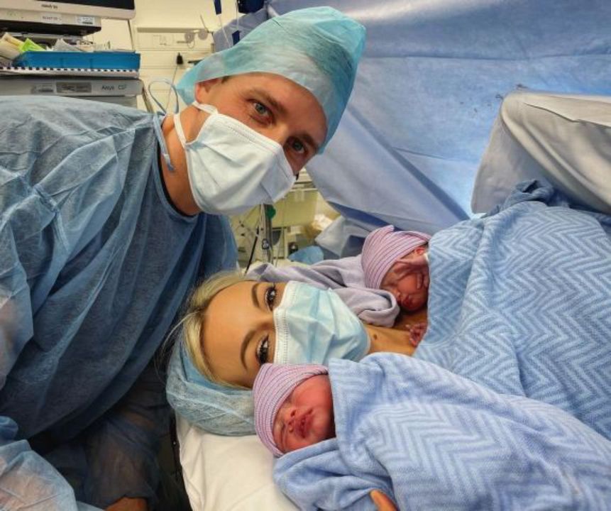 The proud parents at the birth of their identical twins Hugo and Oscar