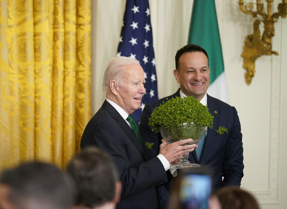 Taoiseach Leo Varadkar presents US President Joe Biden with a bowl of Shamrock (Niall Carson/PA)