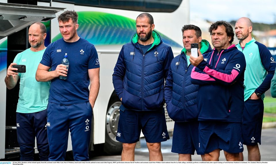 Members of the Ireland squad, from left, assistant coach Mike Catt, Peter O’Mahony, head coach Andy Farrell, national scrum coach John Fogarty, IRFU performance director David Nucifora and assistant coach Peter Wilkins watch students from De La Salle college, Auckland, perform a traditional haka after squad training at North Harbour Stadium in Auckland, New Zealand. Photo: Brendan Moran/Sportsfile