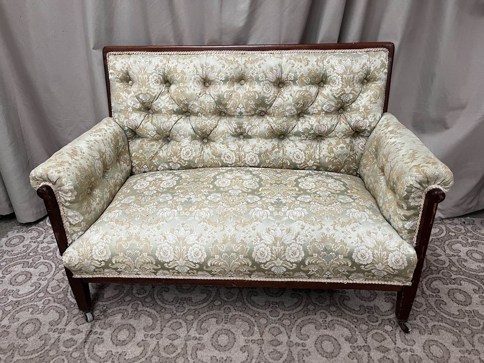 A deep-buttoned two seater settee on as seen in the television series Normal People, priced at €200-€400, will feature in the Historic Interiors online auction valued at €400,000 from December 5-8. See irishcountryhome.com for more. Image credit: Niall Mullen.