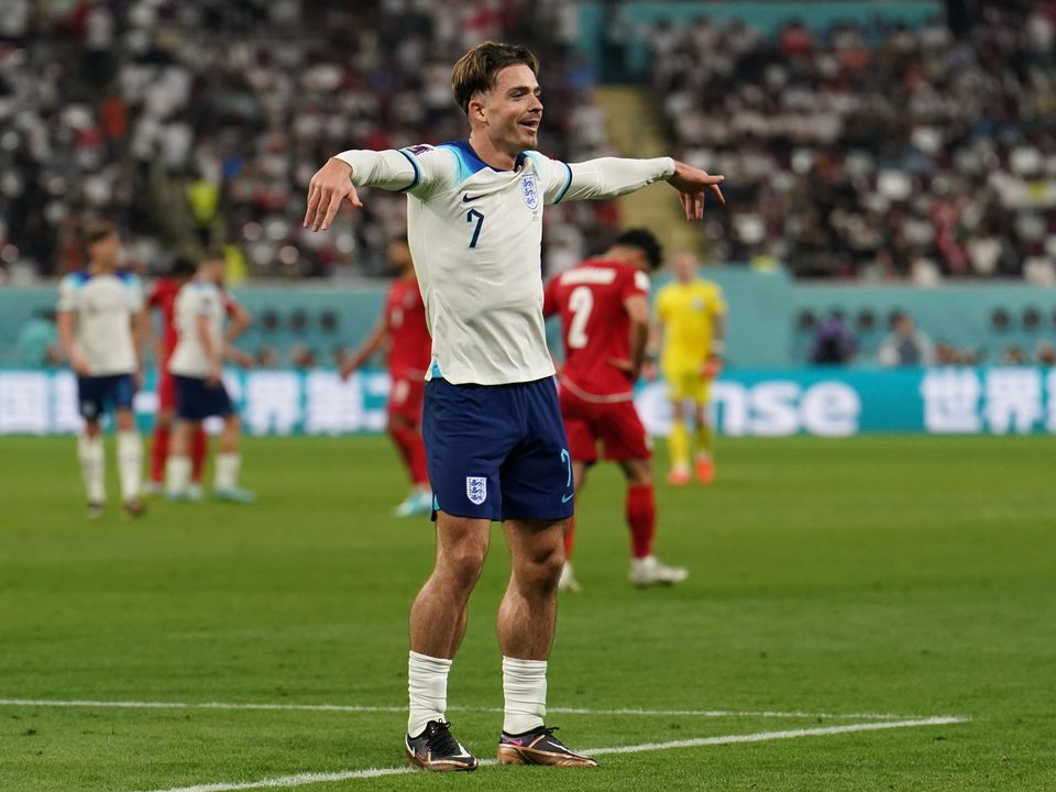 England's Jack Grealish celebrates scoring their side's sixth goal of the game during the FIFA World Cup Group B match at the Khalifa International Stadium in Doha, Qatar. Picture date: Monday November 21, 2022.