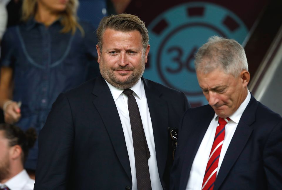 Manchester United chief executive Richard Arnold, left, told fans the club were taking “decisive action” to improve on-field results (Martin Rickett/PA)