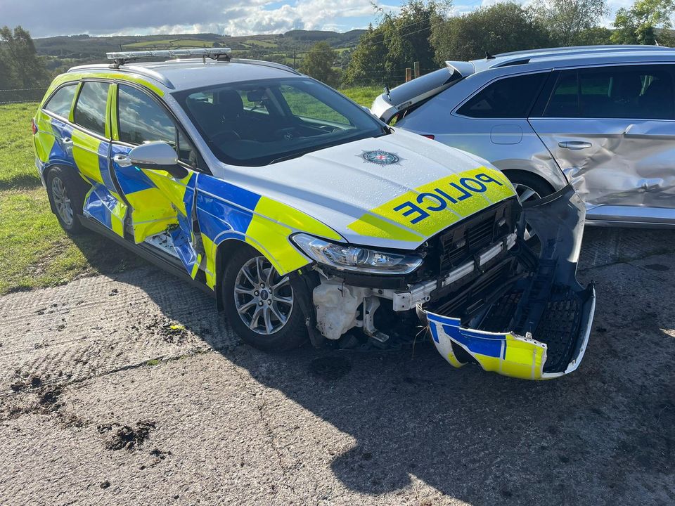 A PSNI vehicle which was damaged by a suspect trying to escape on a tractor (Photo credit: PSNI)