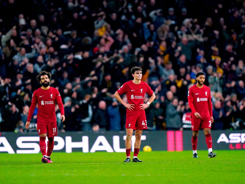 Liverpool's Stefan Bajcetic (centre) appears dejected after Wolverhampton Wanderers' Ruben Neves (not pictured) scores their side's third goal of the game during the Premier League match at Molineux Stadium, Wolverhampton. Picture date: Saturday February 4, 2023. PA Photo. See PA story SOCCER Wolves. Photo credit should read: Tim Goode/PA Wire.

RESTRICTIONS: EDITORIAL USE ONLY No use with unauthorised audio, video, data, fixture lists, club/league logos or "live" services. Online in-match use limited to 120 images, no video emulation. No use in betting, games or single club/league/player publications.