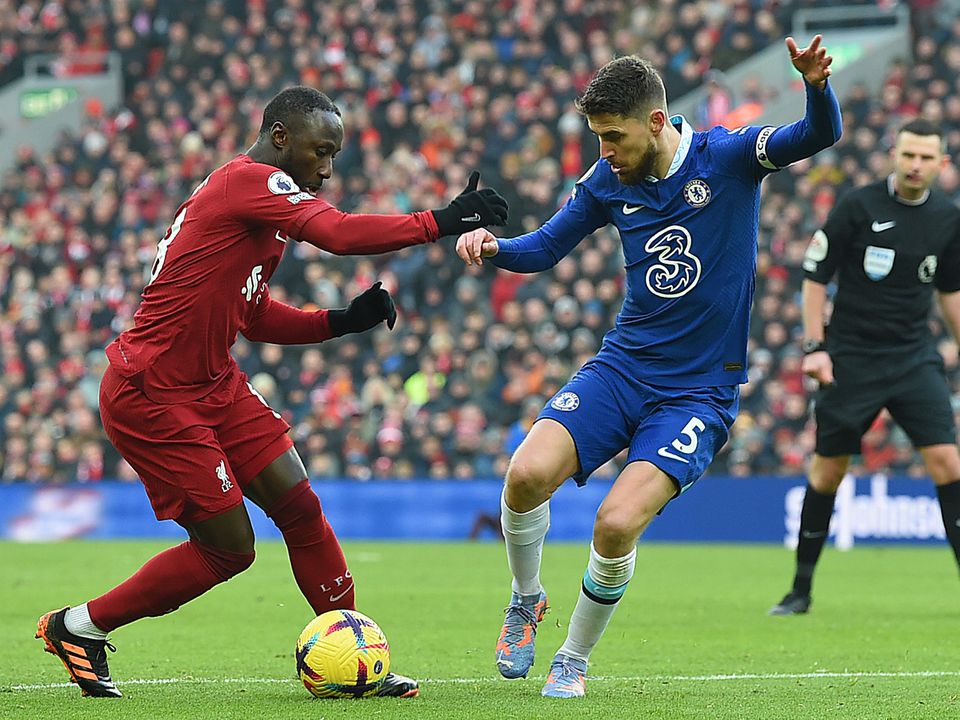 LIVERPOOL, ENGLAND - JANUARY 21: (THE SUN OUT. THE SUN ON SUNDAY OUT) Naby Keita of Liverpool with Jorginho of Chelsea in action during the Premier League match between Liverpool FC and Chelsea FC at Anfield on January 21, 2023 in Liverpool, England. (Photo by John Powell/Liverpool FC via Getty Images)