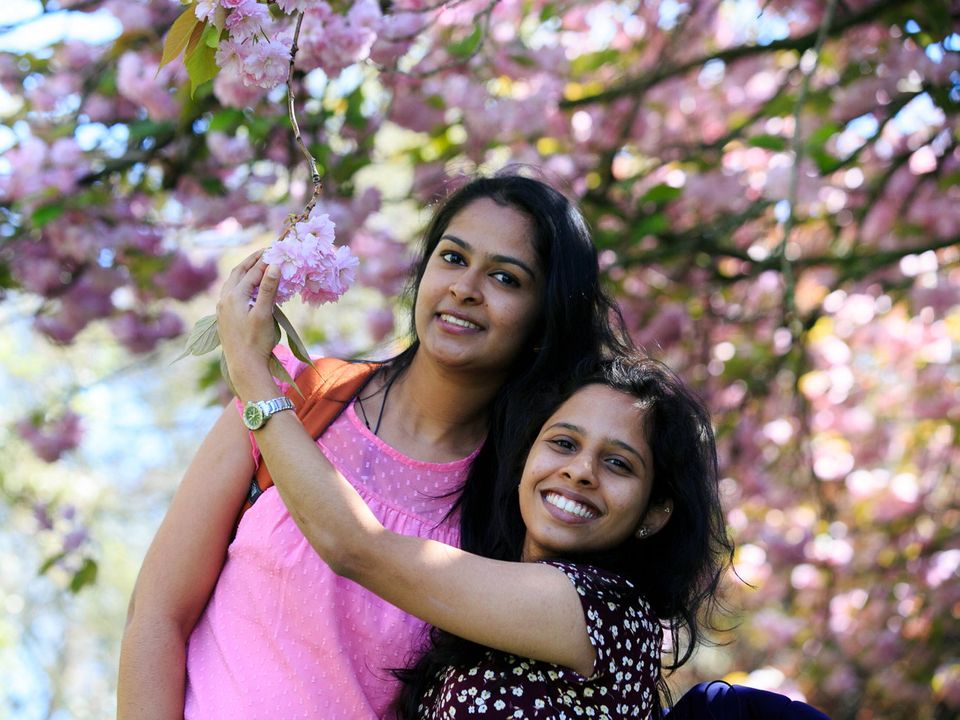 People enjoy sunshine in Stephen's Green, Dublin