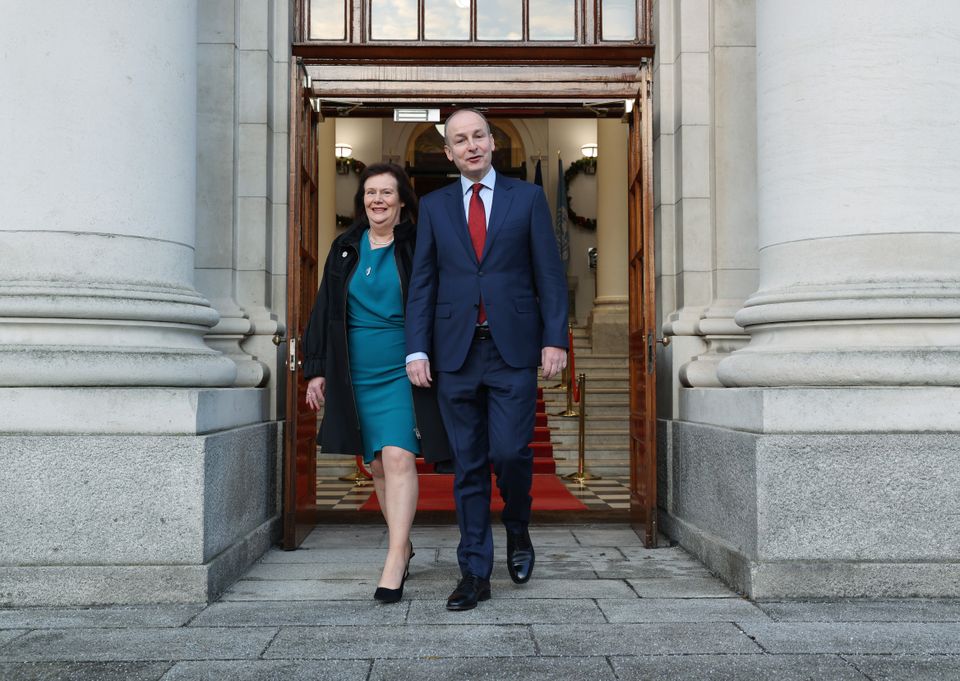 Taoiseach Micheál Martin with his wife Mary Martin pictured leaving Government Buildings before travelling to Áras an Uachtarain to tender his resignation to President Michael D.Higgins.