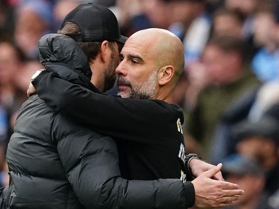 Manchester City manager Pep Guardiola (right) knows his side missed a chance to beat Jurgen Klopp’s Liverpool (Martin Rickett/PA)