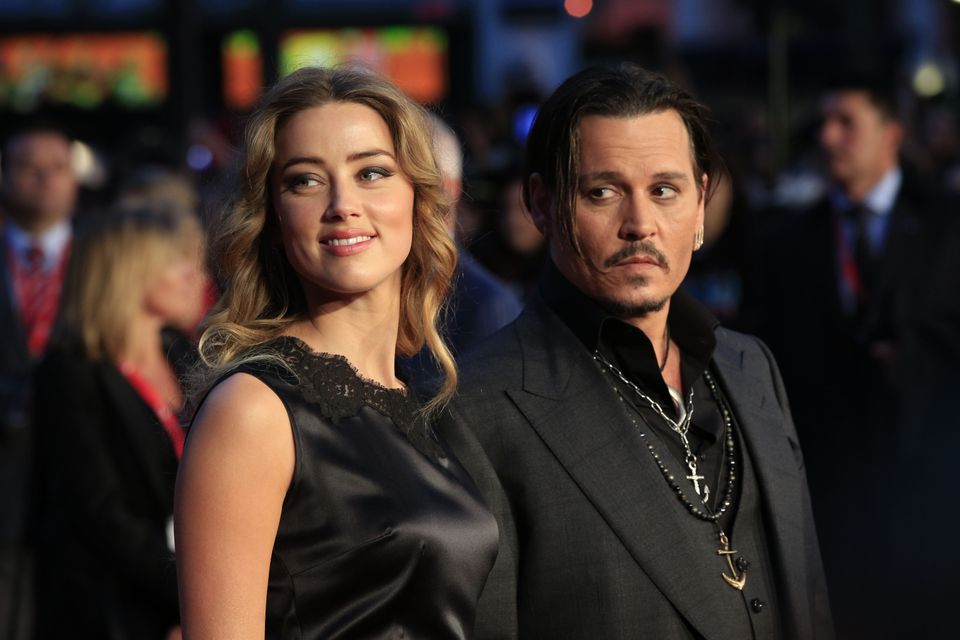 Amber Heard and Johnny Depp in 2015 (Jonathan Brady/PA)