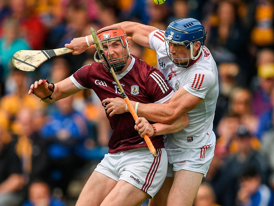 Conor Whelan of Galway is tackled by Sean O’Donoghue of Cork , Tipperary. Photo by Ray McManus