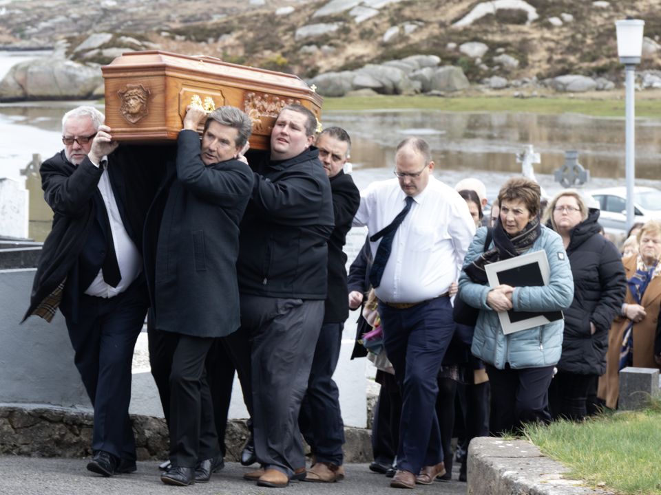 Daniel O'Donnell and family members carry the remains of is beloved sister Kathleen in St Mary's Church, Kincasslagh.  (NW Newspix)