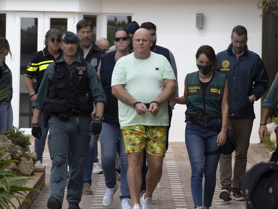 Kinahan Cartel member Johnny Morrissey is led away after he was arrested by police at his apartment in Marbella. Photo: ASA/GC