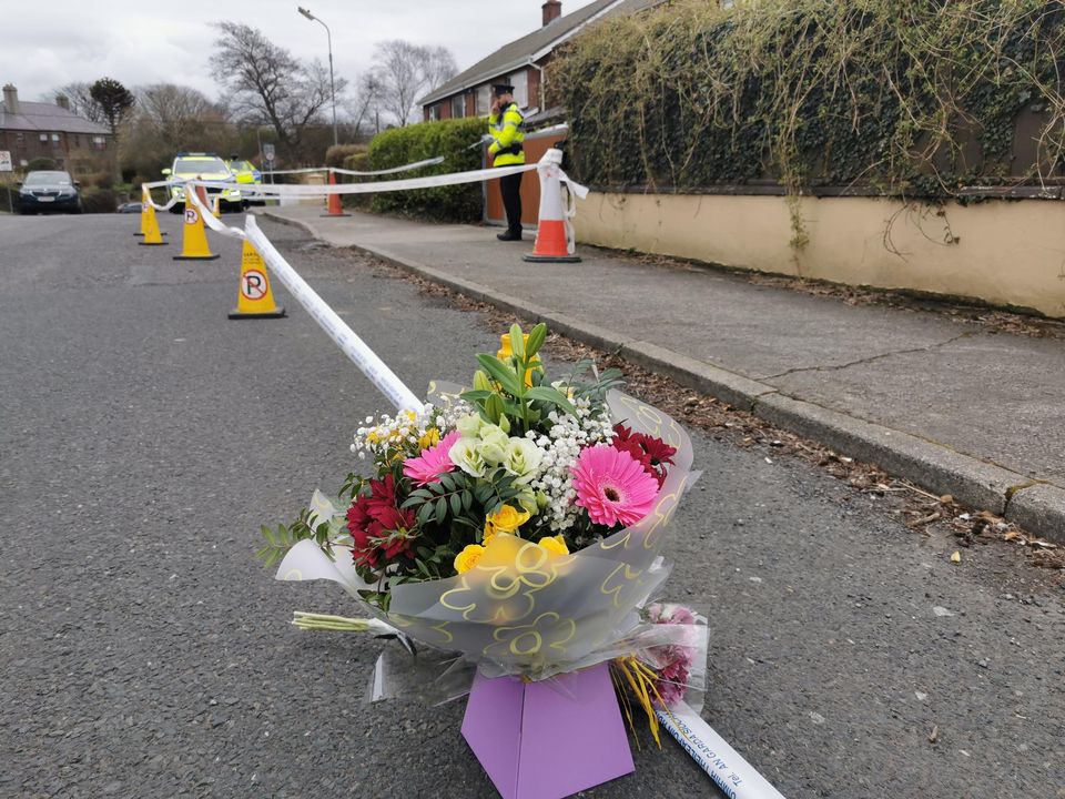 Flowers left outside the home at Cartron Heights, Sligo of Mr Aidan Moffitt who was found brutally murdered. Pic: Donal Hackett.