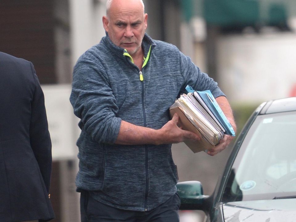 P J Rigney outside Tullamore Court.