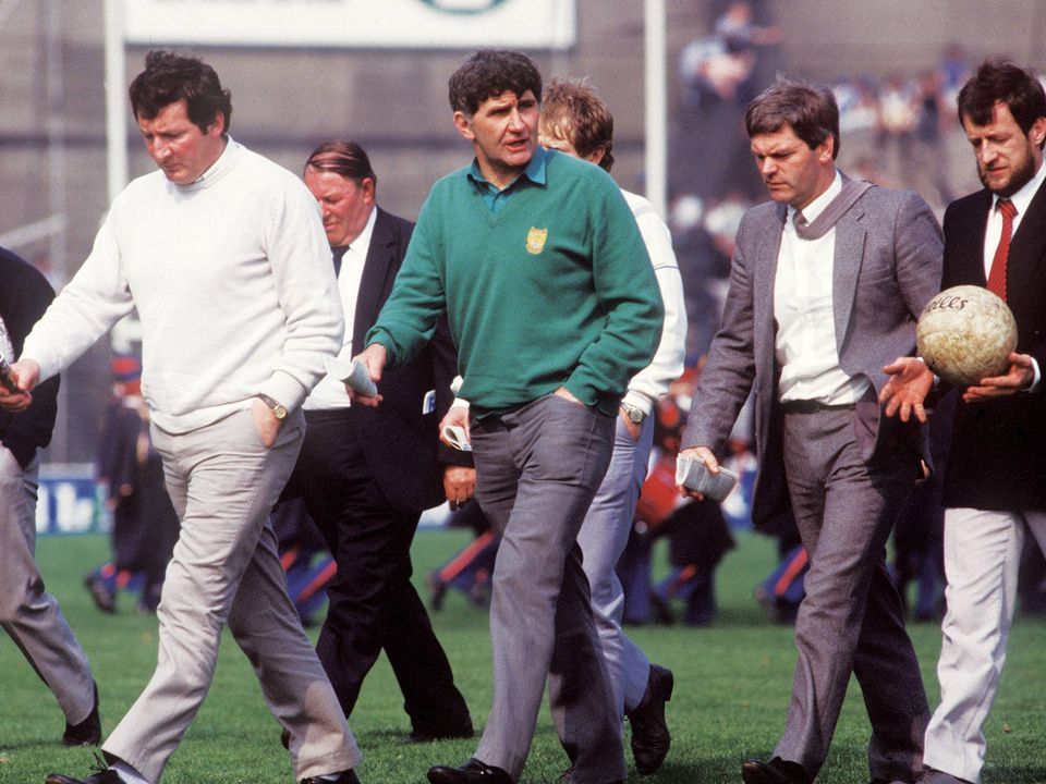 23 September 1984; Tim Kennelly, 2nd from left, leaves the field at half-time alongisde Kerry manager Mick O'Dwyer, centre, and then Kerry County Board Chairman Sean Kelly, right. All-Ireland Football Final, Kerry v Dublin, Croke Park, Dublin. Picture credit; Ray McManus / SPORTSFILE