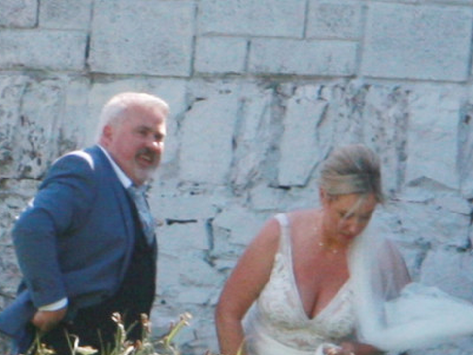 McArdle and Claire Dollard outside the church after their wedding