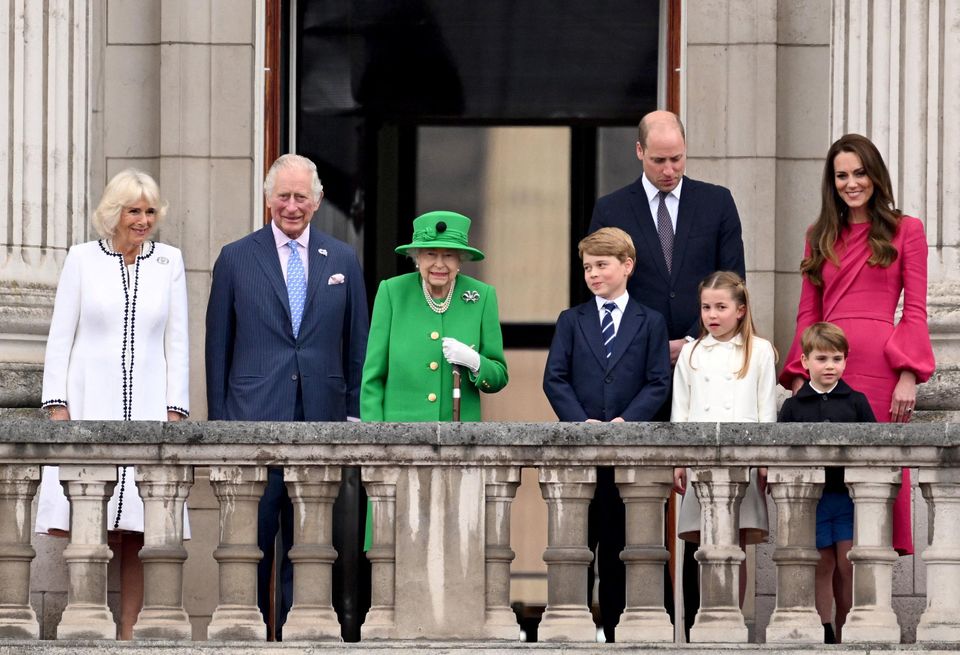 Lineage: Camilla, Charles, Queen Elizabeth, Prince William, Kate, Prince George, Princess Charlotte and Prince Louis on the balcony at the palace. Photo: Hannah McKay/Reuters