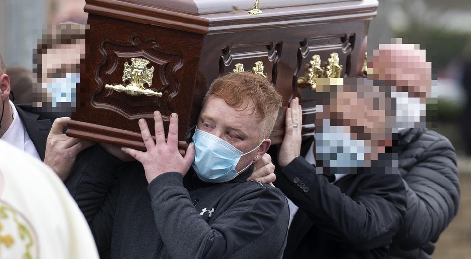 Mr Doyle's remains are carried from church after funeral mass by family members including nephew Declan Haughney this morning. Picture Colin Keegan, Collins Dublin