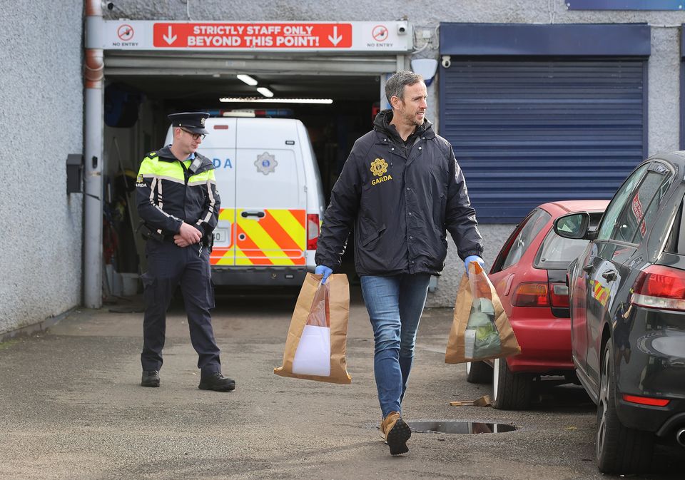 Gardaí at the scene of one of the raids in Dublin. Photo: Frank McGrath