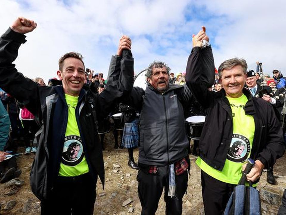 Charlie Bird celebrates summiting Croagh Patrick with Ryan Tubridy and Daniel O'Donnell.