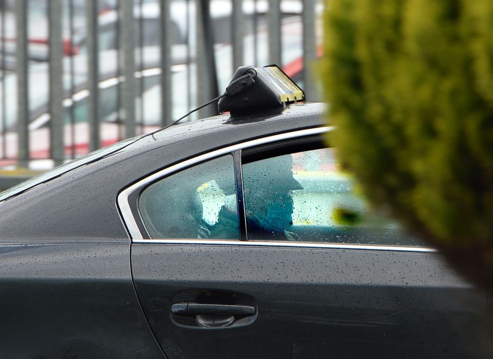 Eddie Tighe, following his release from prison being driven away in a taxi. Photo: Sunday World