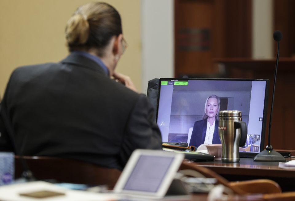 Ms Moss appeared by videolink in Fairfax County District Court (Evelyn Hockstein/AP)