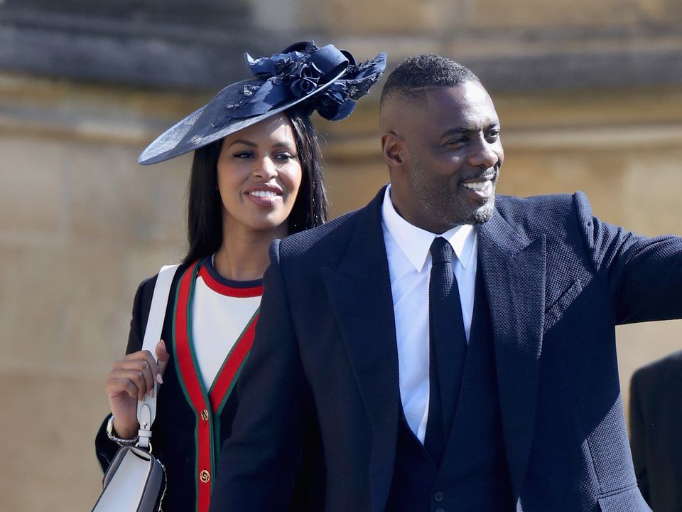 Idris Elba and his wife Sabrina Dhowre at the royal wedding (Chris Jackson/PA)