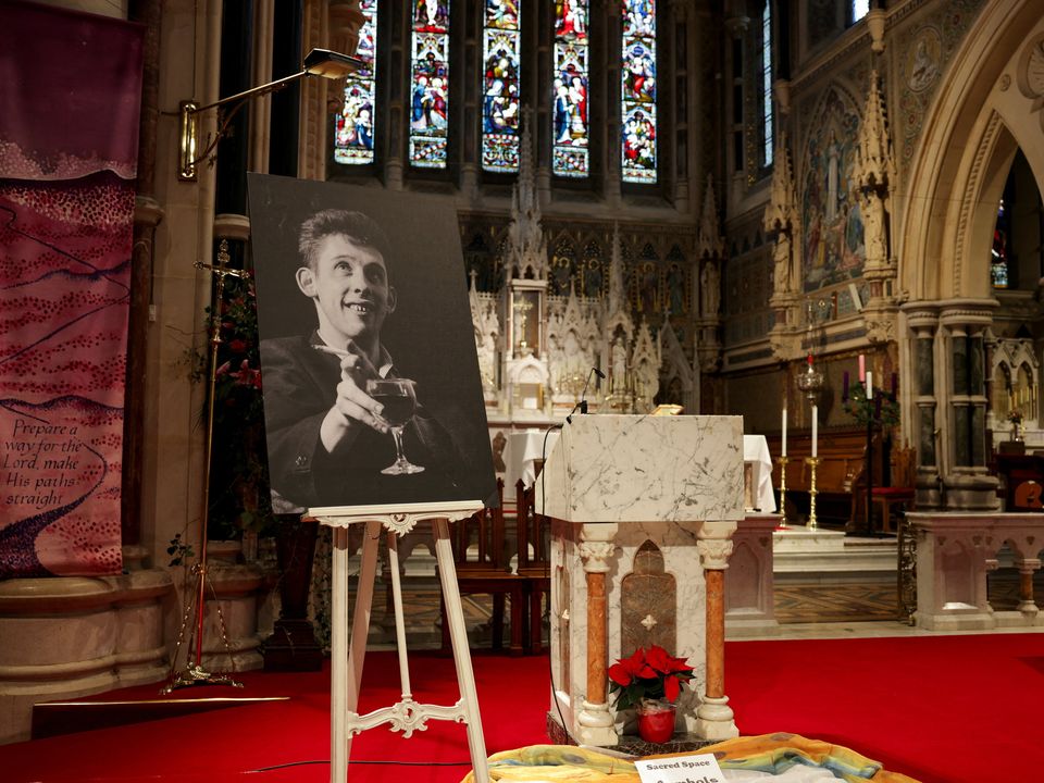 A picture of Shane on the altar. Photo: PA