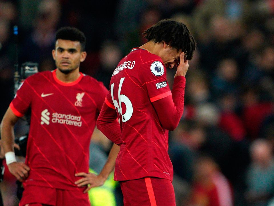Liverpool's Trent Alexander-Arnold (right) and Luis Diaz appear dejected after the final whistle following the Premier League match at Anfield, Liverpool.