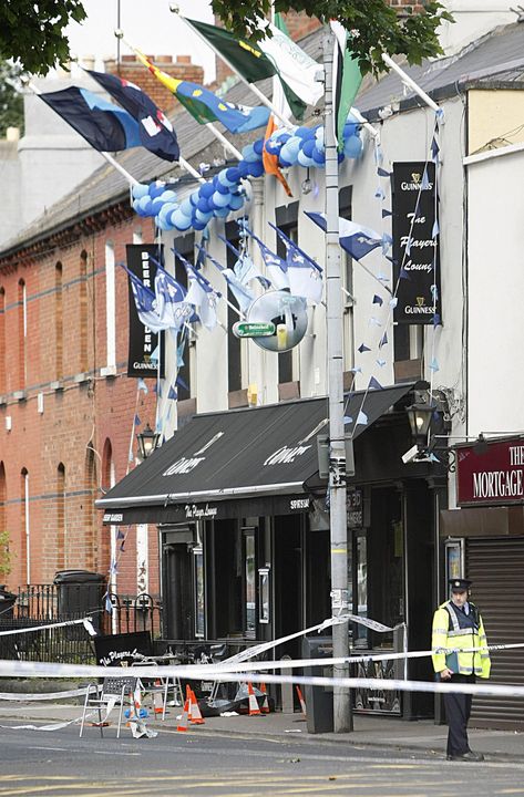 Outside the Players Lounge pub after the gun attack