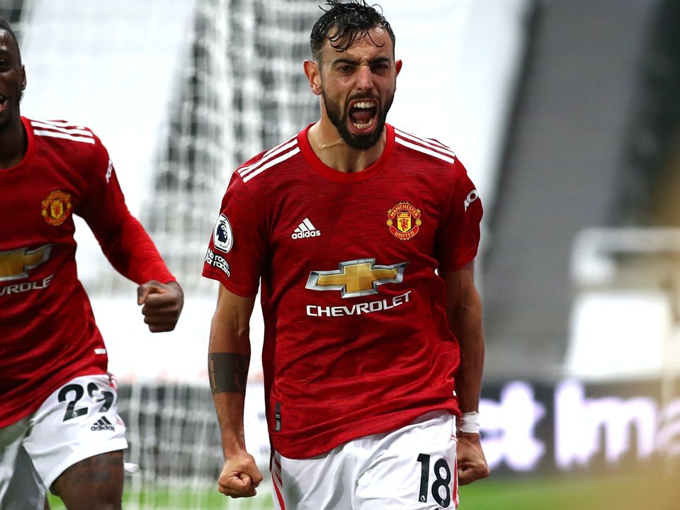 Manchester United’s Bruno Fernandes (right) celebrates his goal at Newcastle (Alex Pantling/PA)