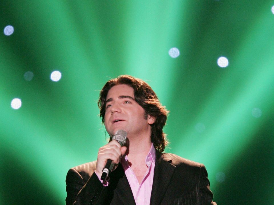 ATHENS - MAY 18: Singer Brian Kennedy of Ireland performs at the semi-finals of the 2006 Eurovision Song Contest May 18, 2006 in Athens, Greece. (Photo by Sean Gallup/Getty Images)