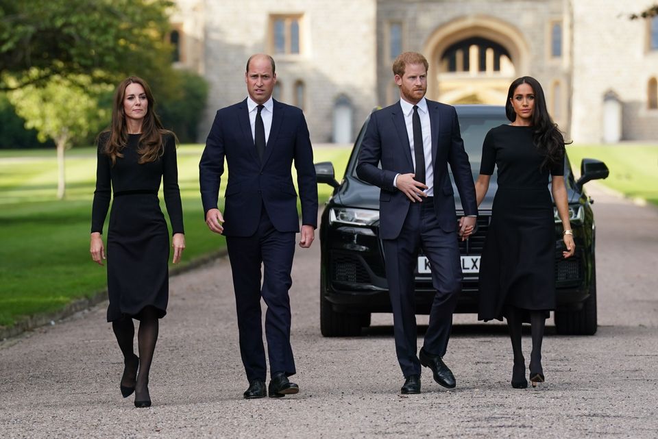 The Princess of Wales, the Prince of Wales and the Duke and Duchess of Sussex walk to meet members of the public at Windsor Castle in Berkshire following the death of Queen Elizabeth II on Thursday.