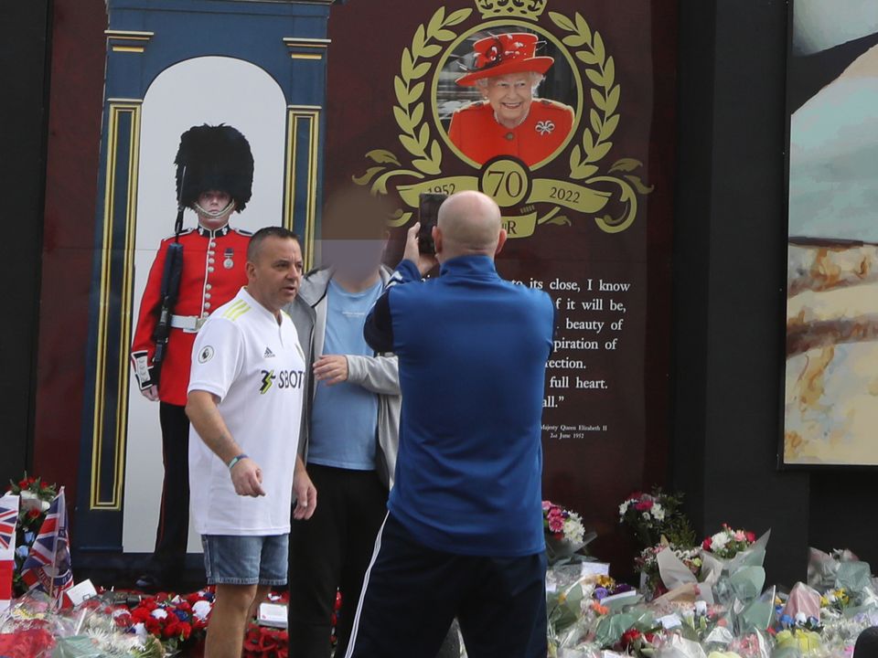 Kane wearing a football shirt at the memorial this week