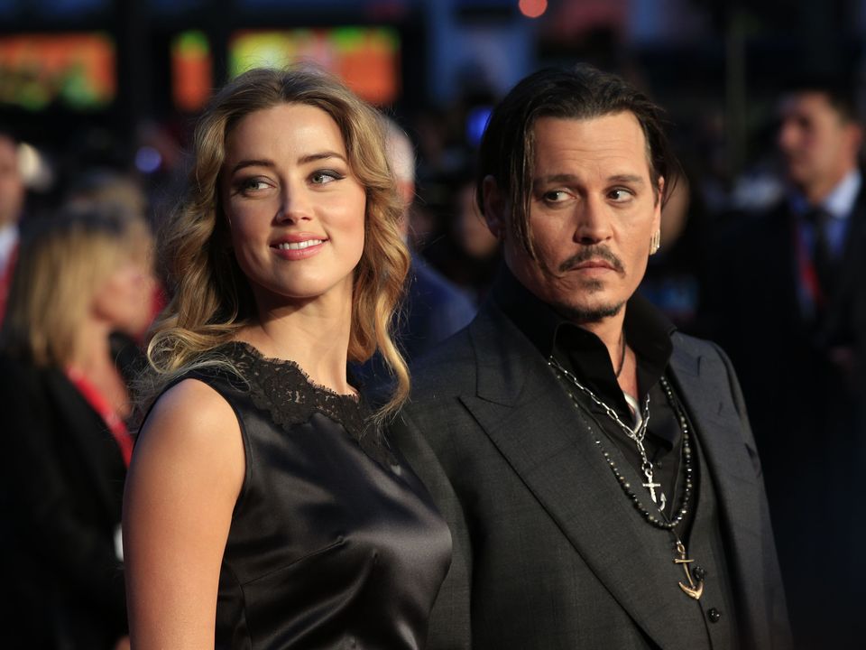 File photo dated 11/10/2015 of Amber Heard and Johnny Depp attending the premiere of Black Mass during the 59th BFI London Film Festival at the Odeon Leicester Square, London. Johnny Depp has said he "feels at peace" and is "truly humbled" after winning his multimillion-dollar US defamation lawsuit against former wife Heard. Mr Depp sued the Aquaman star for 50 million dollars over the piece, titled: "I spoke up against sexual violence - and faced our culture's wrath. That has to change." Issue date: Wednesday June 1, 2022.