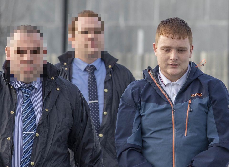 Stephen Dowling (right) is escorted in to court by gardai (North West Newspix)