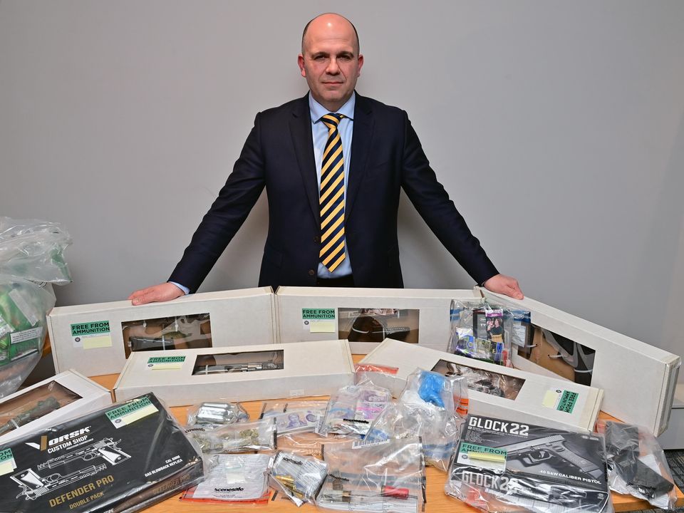 Det Chief Insp Richard Thornton with some of the drugs and weapons seized this week