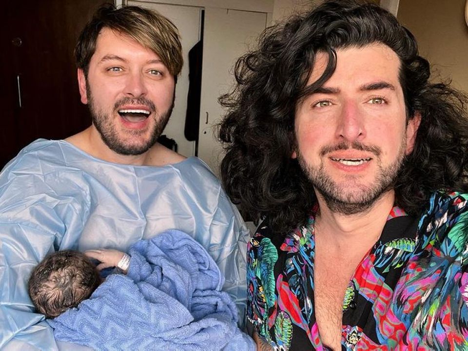 New parents Brian Dowling and Arthur Gourounlian with baby Blake. Photo: Brian Dowling Instagram