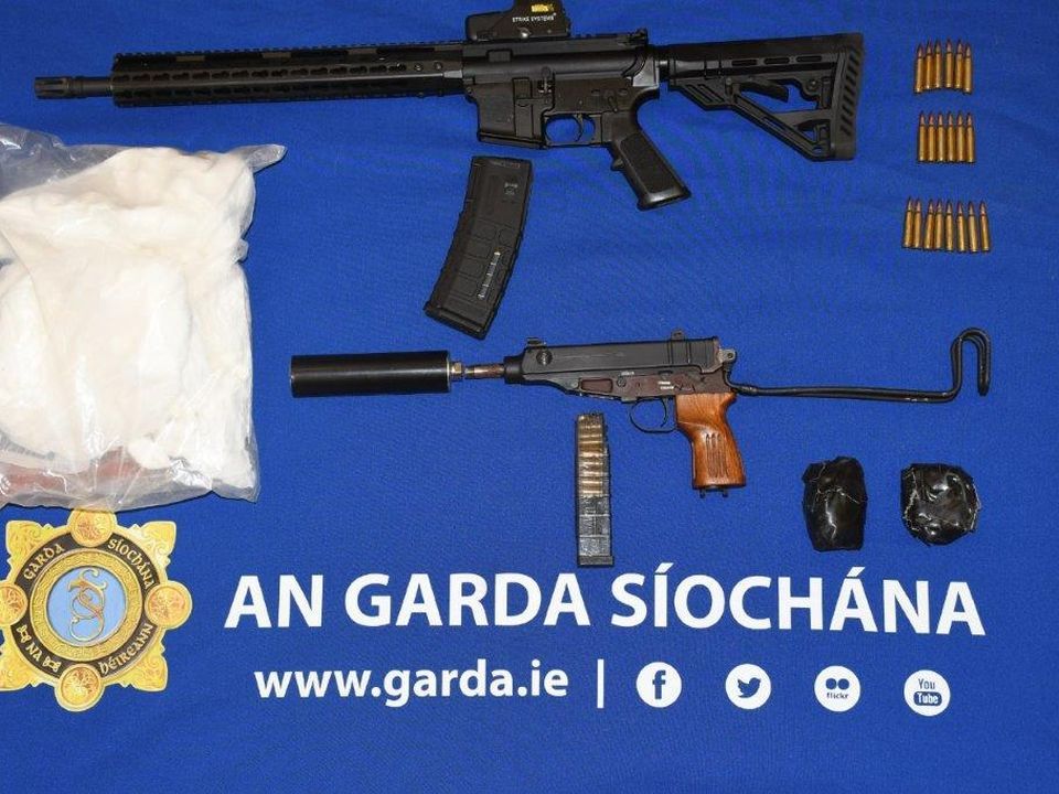 The seized firearms and cocaine from earlier search on November 20th