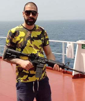 Petkov from Varna, Bulgaria, can be seen posing with an automatic rifle ‘transiting the high risk’ Gulf of Aden