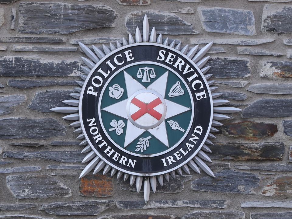 Serving PSNI officer Timothy Hampton remains suspended on his full salary