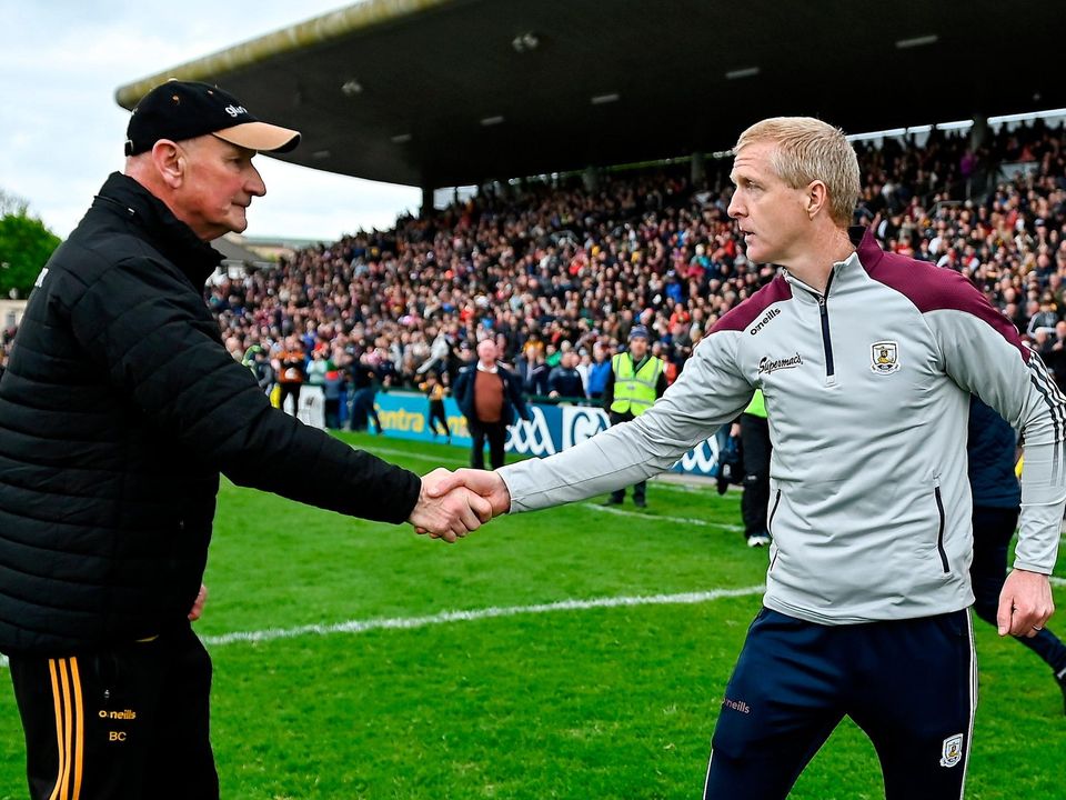 Kilkenny manager Brian Cody, left, and Galway manager Henry Shefflin shake hands after the match at Pearse Stadium. Photo: Brendan Moran/Sportsfile