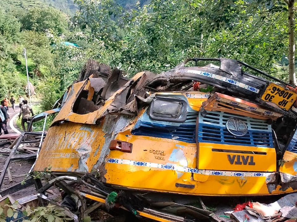 The wreckage of a passenger that bus slid off a mountain road and fell into a deep gorge in Kullu, India on Monday. (AP)