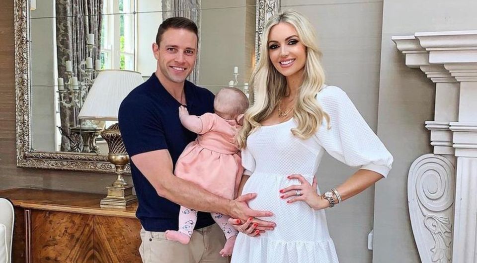 Rosanna pictured when she was pregnant with the twins, alongside husband Wes and baby Sophia
